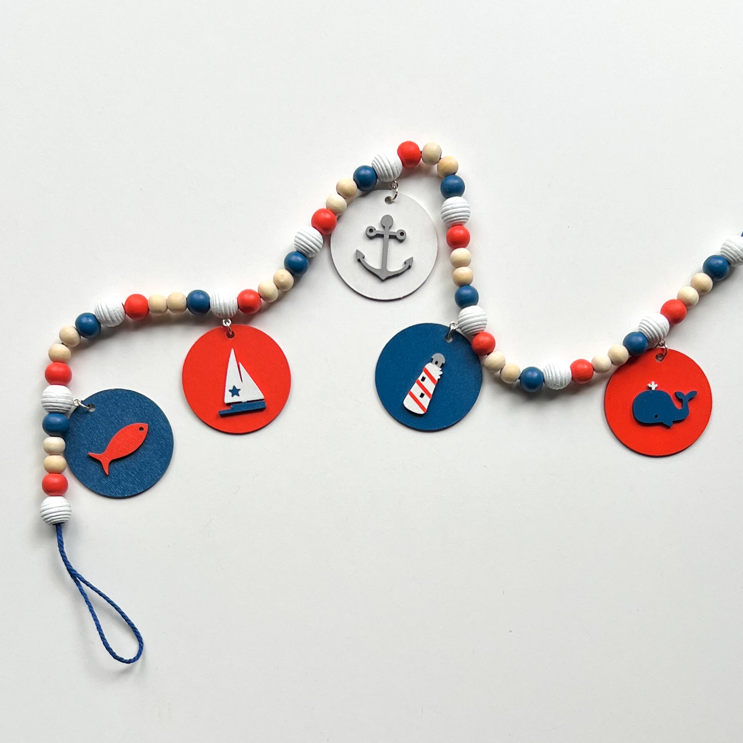 Calm Little Seas Handmade Mini Garland. Features wood circles with a fish, sailboat, anchor, lighthouse, whale. Summer nautical beachy decor or gfits.