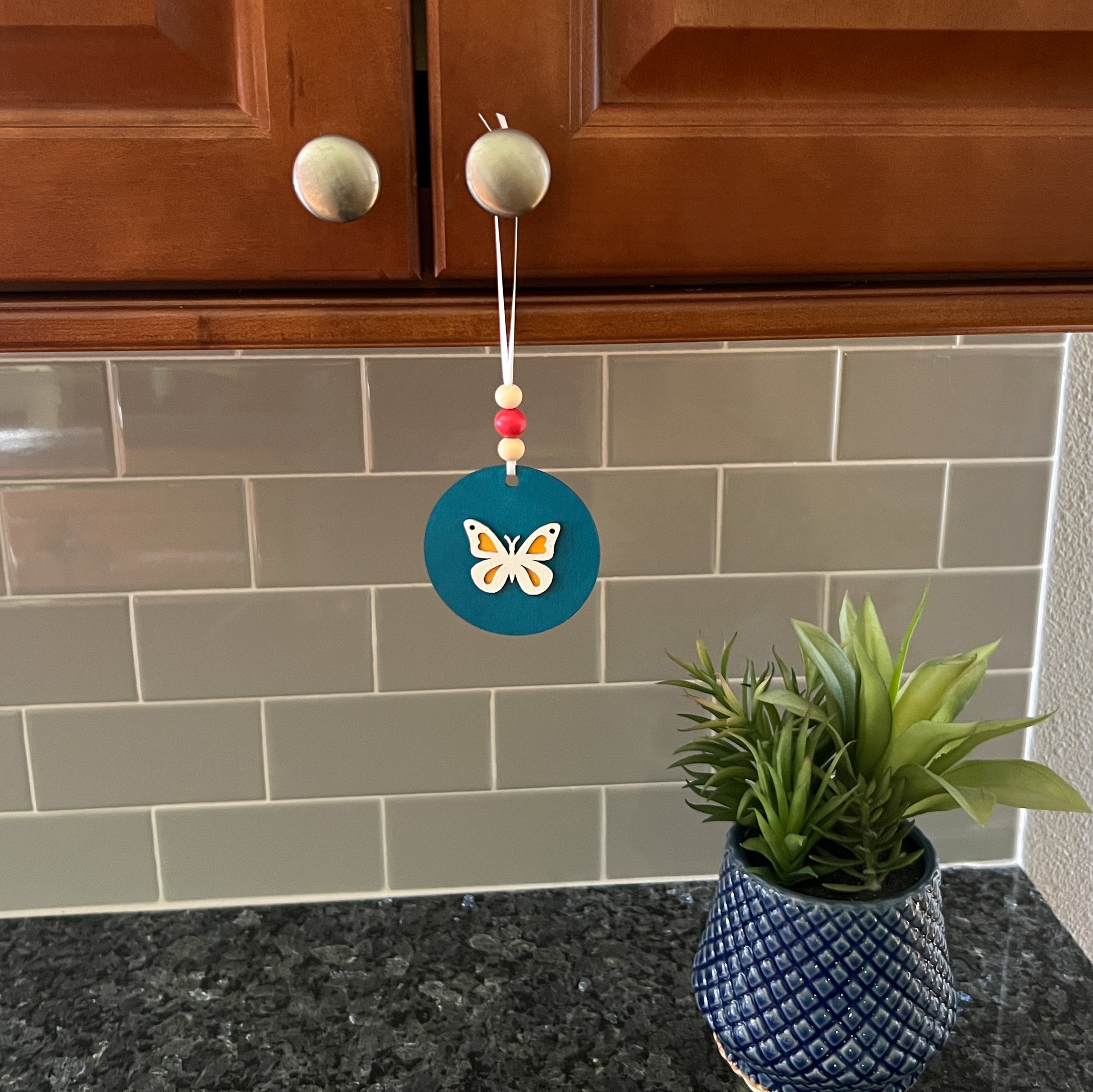 In the Garden Ornament Set. Three ornaments featuring a bird, birdhouse, butterfly. Year-round holiday tree, spring decor or gift.