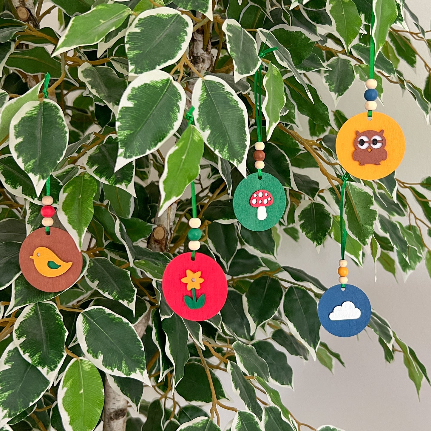 Little Nature Walk Handmade Ornament Set of 5. Ornaments feature feature nature themed shapes - a cloud, a flower, an owl, a toadstool, or a bird. Summer or spring decor; tree decoration.