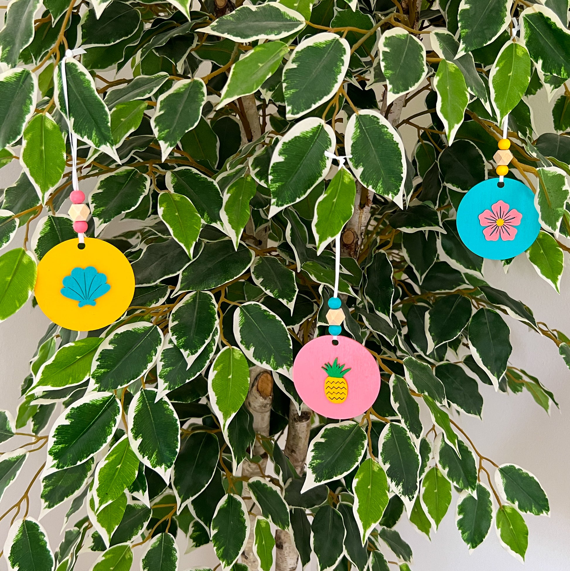 Summer Vacay Ornament Tropical Set. Wood ornaments with a pineapple, a flower, or a shell. Summer tropical decor or gift; year-round holiday tree decoration.