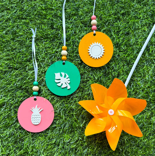 Fun in the Sun Tropical Ornament Set of 3. Wood ornaments featuring a monstera leaf, pineapple, or sun. Seasonal summer decor; year-round holiday tree ornament.