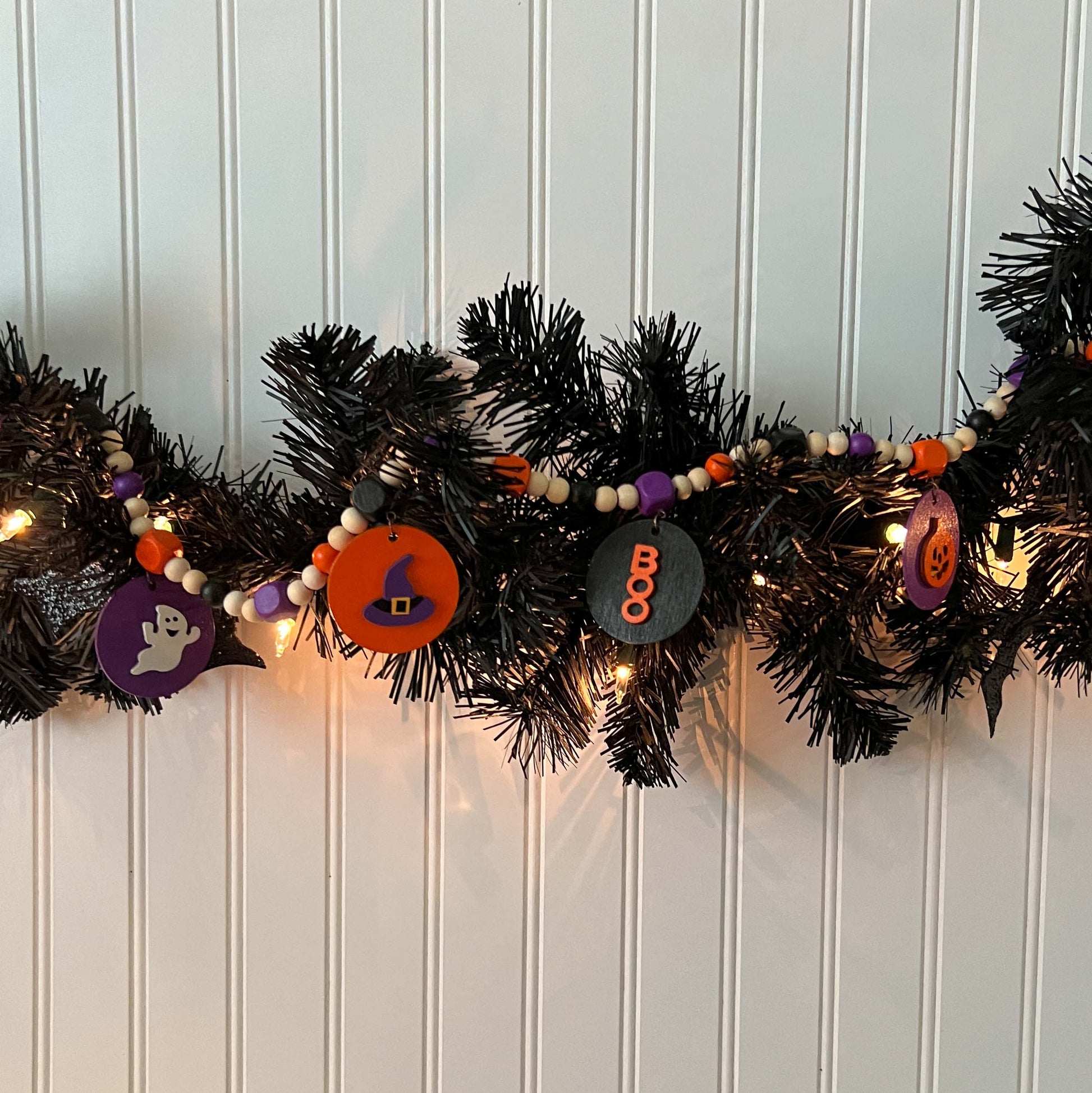 Little Boo Handmade Mini Garland. Features five flat wood circles with a ghost, a witches hat, a "boo" cutout, a jack-o-lantern, or a bat.  Halloween fall seasonal decor and gifts.
