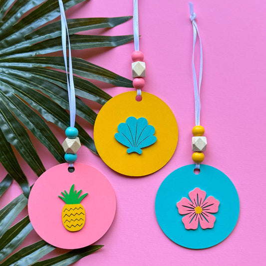 Summer Vacay Ornament Tropical Set. Wood ornaments with a pineapple, a flower, or a shell. Summer tropical decor or gift; year-round holiday tree decoration.