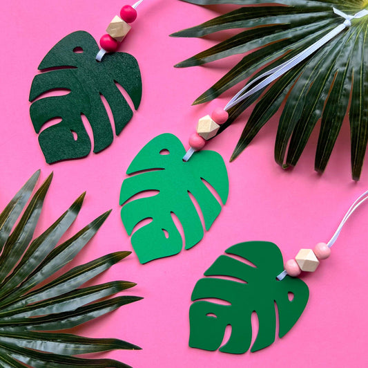 Tropical Breeze Handmade Ornament Set of 3. Wood monstera leaf ornaments with wood beads. Summer, tropical themed home decor and gifts.